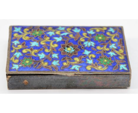 An unmarked white metal and enamel snuff box, possibly Indian, with floral decoration, 7.5 x 4.5 x 1cm 