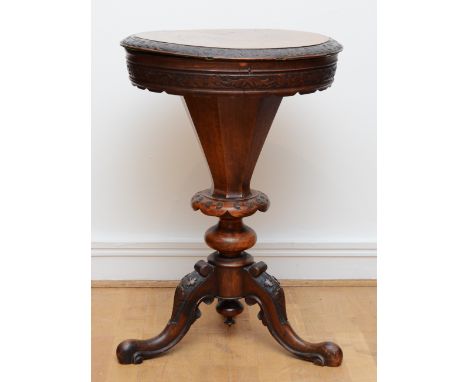 A Victorian burr walnut sewing table of trumpet form, the thumb moulded lid opening to a baize lined interior with fitted com