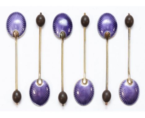 An Art Deco set of silver and enamel bean end coffee spoons, Birmingham 1928, the bowls with purple guilloche enamel, 9.5cm, 
