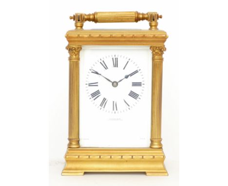 An early 20th century large gilt brass carriage clock, the 8 day movement stamped 'Made In France' string on gong, 15cm tall.