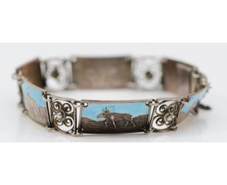 A Swedish 830 standard silver and enamel panel link bracelet, composed of six panels with reindeer, stamped 830S, 19cm, 13gm