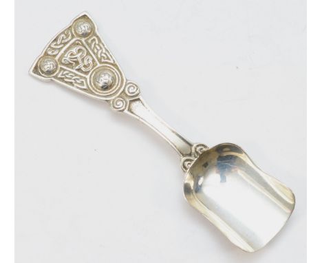 A Scottish silver Celtic caddy spoon, by A.L, Edinburgh 1949, untraced, with cast handle, 11.5cm, 28gm 