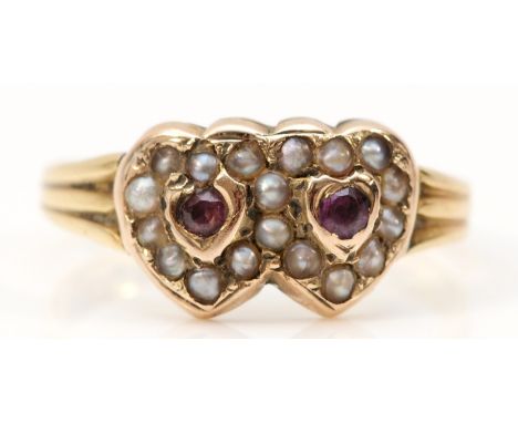 A Victorian 9ct gold ruby and half pearl double heart ring, Birmingham 1899, N 1/2, 1.8gm 