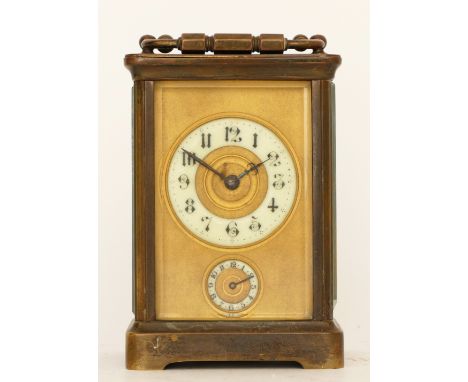 An early 20th century brass carriage clock, porcelain dial with Arabic numerals, subsidiary alarm dial having eight day movem