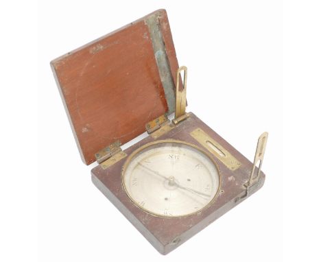 A 19th century mahogany cased surveyor's compass, having silvered dial, brass folding sights with inset spirit level, 17x15cm