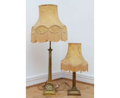 A tall gilt brass table lamp, in the form of Corinthian column on a stepped base, with tassel fabric shade, 103cm tall, toget