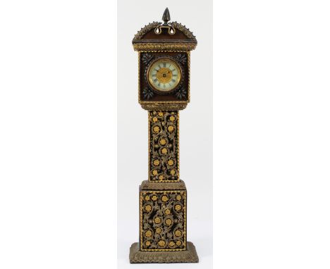 An early 20th century miniature longcase clock, the silk covered mahogany case with gilt ormolu mounted decoration, housing a