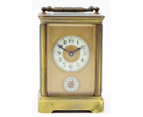 An early 20th century gilt brass French carriage clock, having platform escapement and alarm, the 8 day movement striking on 