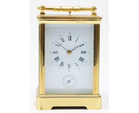 A 20th century French brass corniche case hourly repeater carriage clock, the white enamelled dial with Arabic and Roman nume