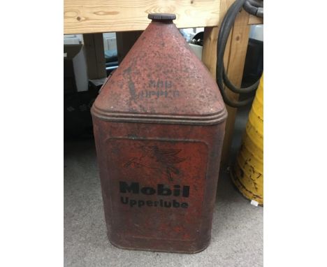 A vintage pyramid 5 gal Mobil oil upper lube oil drum.