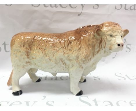 A porcelain Melba Ware Hereford bull figure 24cm tall 44cm long approximately . This lot cannot be posted