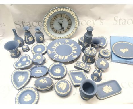 A collection of Wedgewood Jasperware including plates, dishes , clock etc . This lot cannot be posted