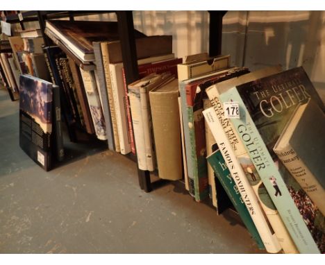 Shelf of golf and fishing books including the Committee report on the 100th Open Golf Chamionship held at Royal Birkdale