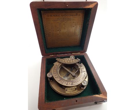 Boxed brass sundial and compass marked JH Steward CONDITION REPORT: Believed to be contemporary sorry but can't be more defin