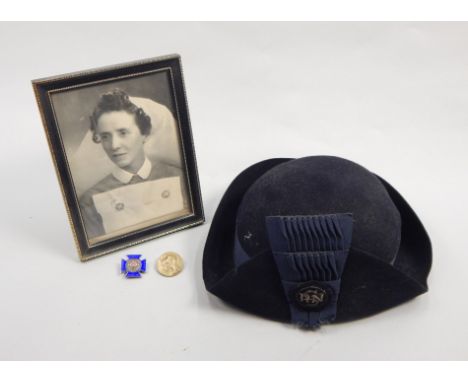 A collection of nurse related items, to include a silver and enamel badge for Royal Infirmary Blackburn, denoting a trained n