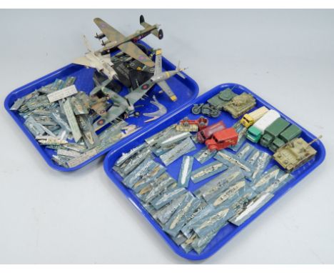 A collection of painted scale models, each in the form of a military boat, die-cast vehicles, to include Lesney etc.