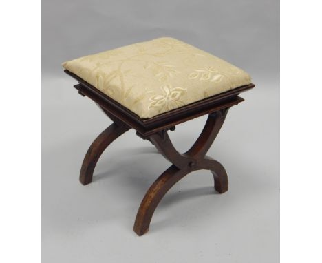 A William IV rosewood stool, with a padded seat, on X shaped supports, (AF).
