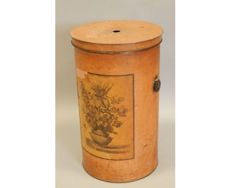 A painted two handled umbrella or stick stand, applied with a print of a still life with flowers etc., stamped to underside, 