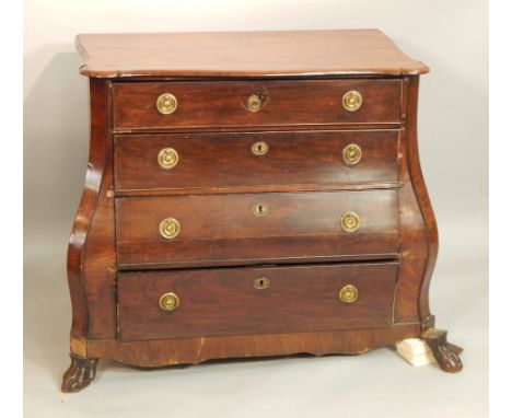 A late 18th/early 19thC Dutch mahogany bombe shaped commode, the top with a moulded edge above four graduated drawers, with l