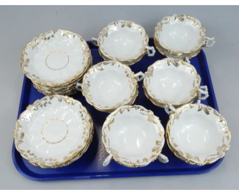 A 19thC Kornilov Brothers Russian porcelain part tea service, decorated in gilt with rococo scrolls, flowers, leaves etc., pr