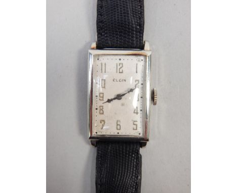 A 1940's Elgin gentleman's 14K white gold cased manual wristwatch, of tank style form with parchment dial, having applied sil