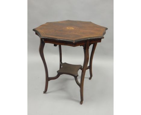 An Edwardian rosewood and marquetry occasional table, with a shaped top, splayed legs and concave undertier, with ceramic cas