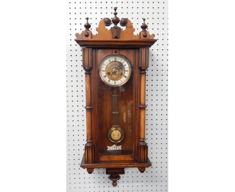 A Vienna type Walnut wall clock, with enamel style dial, 89cm high