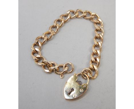A gold plated gate bracelet, with padlock.