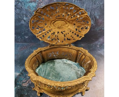 An early 20th-century gilt metal waisted oval pierced casket, the slightly domed cover with figural finial, scroll legs, 24cm