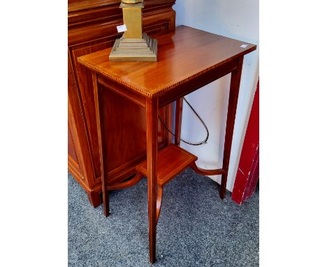 An Edwardian Sheraton Revival mahogany and satinwood inlaid two tier lamp table c.1905, 72cm high x 36cm wide x 32cm deep Ver