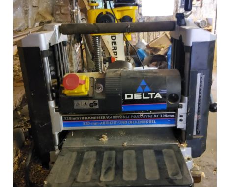 A Delta 320mm Thicknesser, model no 22560    Please note this lot is located offsite and needs to be collected from near J28 