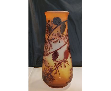 An Art Glass ovoid vase, etched with pine tree and cones, in red on a mottled yellow ground, bears signature Galle, 31.5cm hi