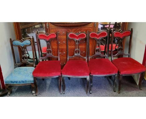 A set of four Art Nouveau ebonised salon chairs, c.1915;&nbsp; a similar nursing chair (5) 