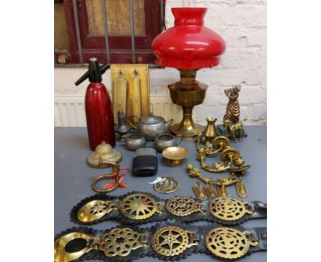 Horse brasses;&nbsp; oil lamp;&nbsp; piano sconces;&nbsp; coat hooks;&nbsp; pewter three-piece tea service;&nbsp; hip flask;&