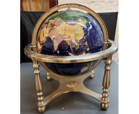 A 20th-century specimen stone globe, silvered stand, compass to base, 50cm diam 