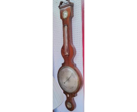 A 19th century walnut, satinwood and ebony barometer with swan neck pediment and silvered dial to the thermometer, barometer 