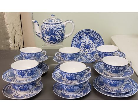 A Noritake tea service, for twelve, comprising teacups and saucers, teapot and two side plates, each piece printed in undergl