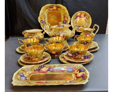 An Aynsley Orchard Gold pattern tea service, comprising teapot and cover, milk jug, sugar bowl, six teacups, five saucers, te