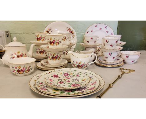 A Colclough tea service, for six, printed with roses, printed marks;&nbsp; another, Queen Anne (2) 