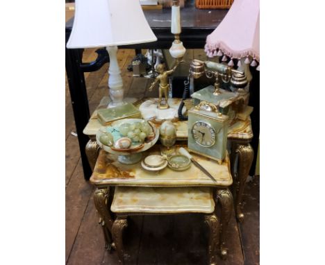 A nest of three onyx side tables;&nbsp; other onyx - lamp, telephone, ash trays;&nbsp; comporet, fruit, paper knife;&nbsp; et