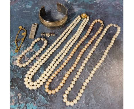 An Isle of Wight Crown standard single-string pearl necklace, silver clasp; another two-string pearl necklace, gold plated si