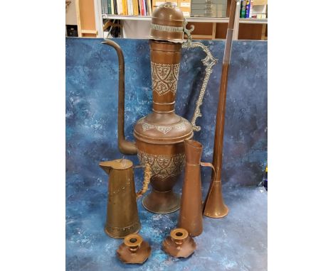 A large Persian copper coffee pot, embossed with strapwork, brass handle, 73cm high;&nbsp; a copper hunting horn;&nbsp; an Ar