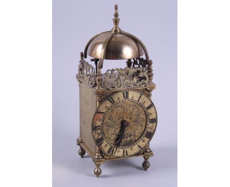 A brass lantern clock with a French carriage clock movement, 9 1/2" high