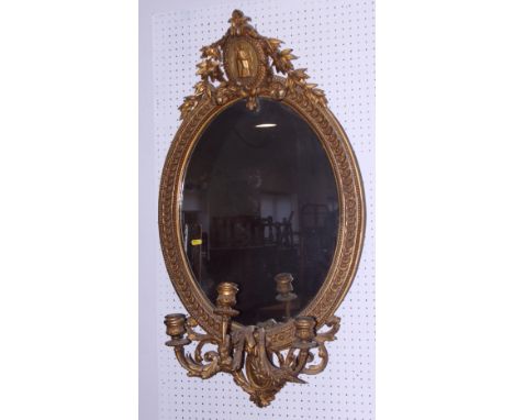 A 19th century gilt framed three-light girandole with classical figure medallion and laurel leaf crest, 39" high