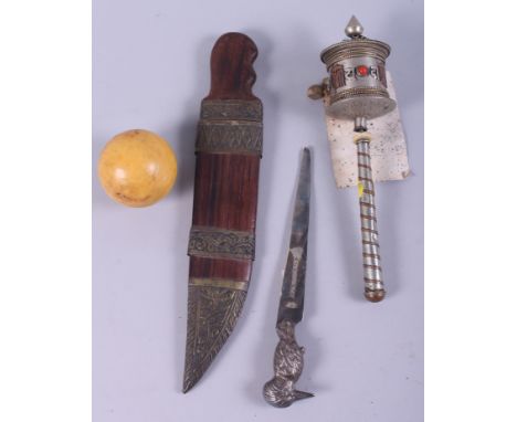 A white metal and stone mounted prayer wheel, a silver plated RMS Oronsay letter opener, a composite billiard ball and a wood