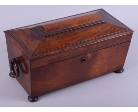 A 19th century rosewood sarcophagus-shaped two-division tea caddy with glass mixing bowl, 13" wide