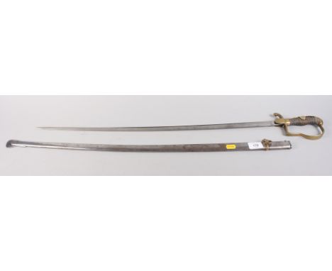 A German officer's WWI sword with etched blade and steel scabbard, blade 28 1/2" long Condition: There are a few dents to the