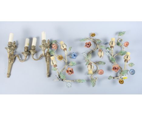 A pair of two-light Adam design brass wall lights together with three two-light floral design painted metal wall lights