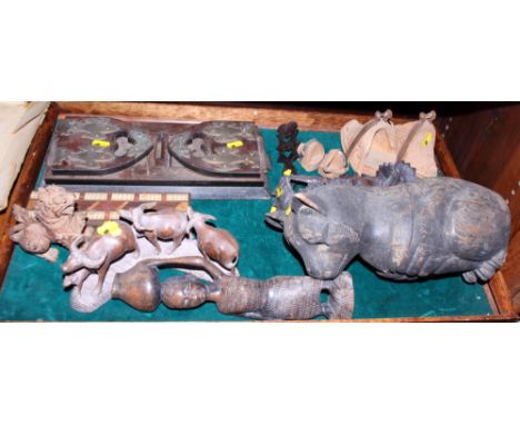 A Victorian Patent walnut and brass mounted book stand, a cut tobacco box, a cribbage board and other wood carvings