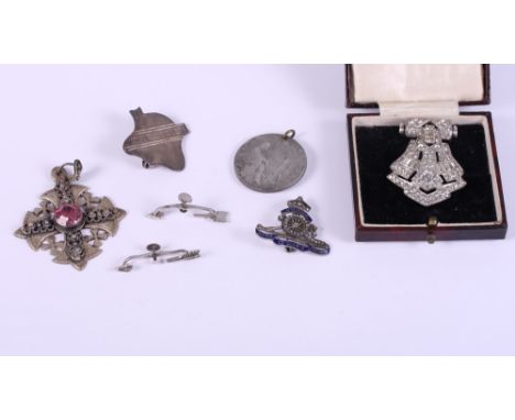 A white metal and paste set lapel clip with scent or poison phial in the hinge, Prov Pat No 29739, a pair of silver and marca